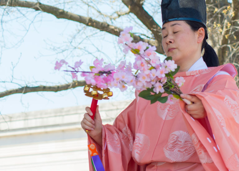 2018 Sakura Matsuri - Reverend Kuniko Kanawa leads students carrying a shrine in front of the U.S. Capitol Building.