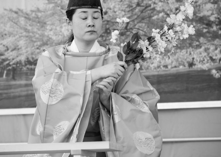 2018 Sakura Matsuri - Reverend Kuniko Kanawa leads students carrying a shrine in front of the U.S. Capitol Building.