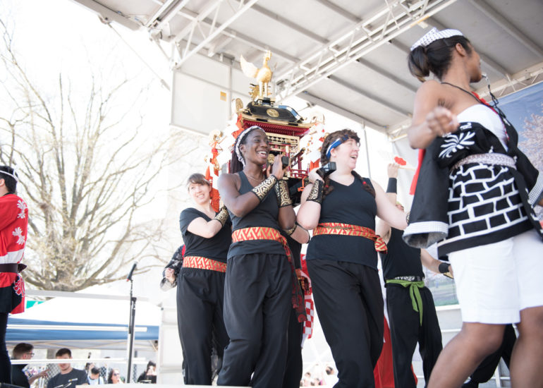2018 Sakura Matsuri - Reverend Kuniko Kanawa leads students carrying a shrine in front of the U.S. Capitol Building.