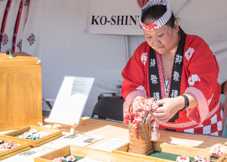 2018 Sakura Matsuri - Reverend Kuniko Kanawa leads students carrying a shrine in front of the U.S. Capitol Building.