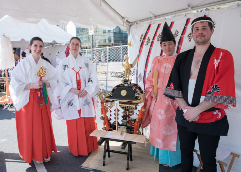 2018 Sakura Matsuri - Reverend Kuniko Kanawa leads students carrying a shrine in front of the U.S. Capitol Building.